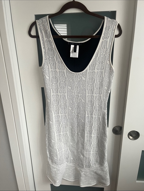 BCBGMaxAzria Dresses & Skirts - BCBGMaxAzria White Lace Asymmetrical Hem Sleeveless Dress.